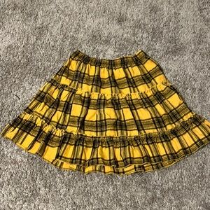 never worn, black and yellow checkered skirt